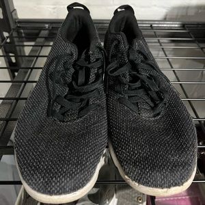 Mens black tennis shoes. Size 11.5. Well used, but in good condition.